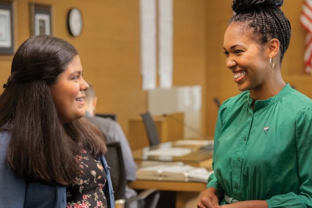 Woman with child in courtroom